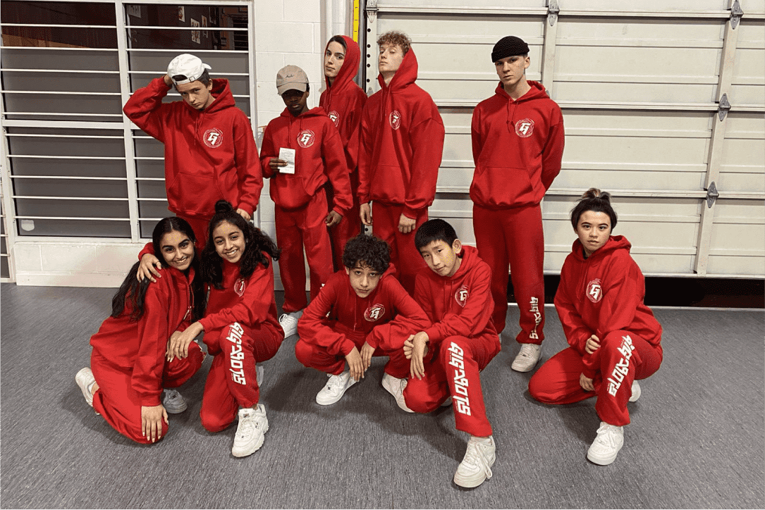 Wordmark on red sweatpants (repeated 3x)